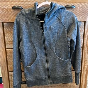 Lululemon zip up sweater with finger holes. Hooded